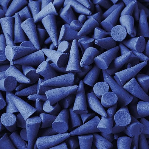 Numerous small, blue cone-shaped objects are scattered closely together, creating a textured surface that covers the entire image. The cones vary slightly in size and are uniformly colored.