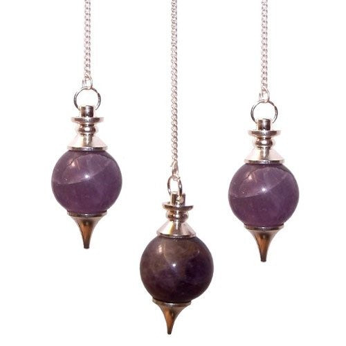 Three amethyst pendulums hang from silver chains. The polished, purple spheres are capped with silver and taper to a point, centered against a white background.
