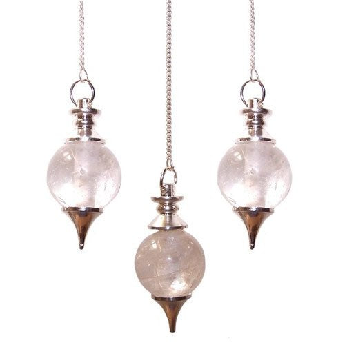 Three clear, crystalline pendulums hang from silver chains. Each has a silver ornament at the top and bottom. The background is white.