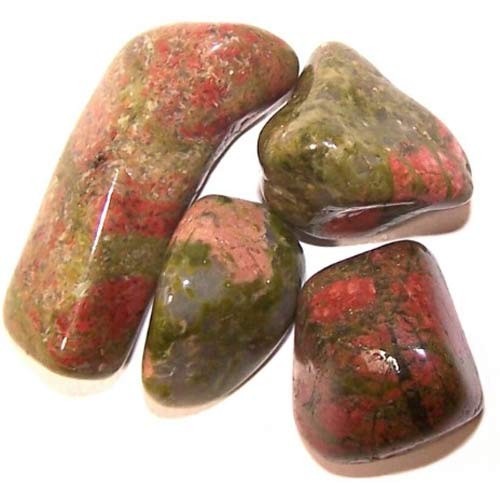 Four polished, speckled unakite stones sit against a white background. The stones show a mix of green and red colors in various patterns.