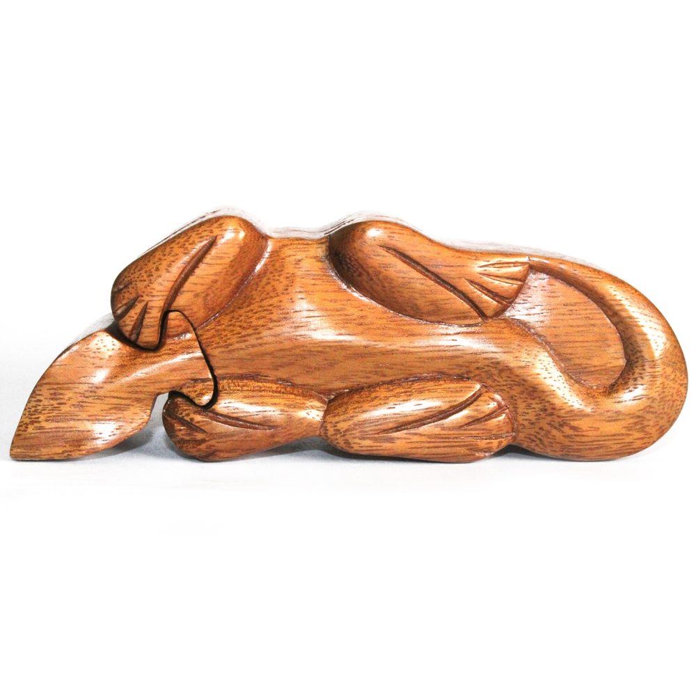 A wooden lizard figurine crafted from smooth, light-colored wood, with detailed carvings on its limbs and tail, lies flat on a plain white background.