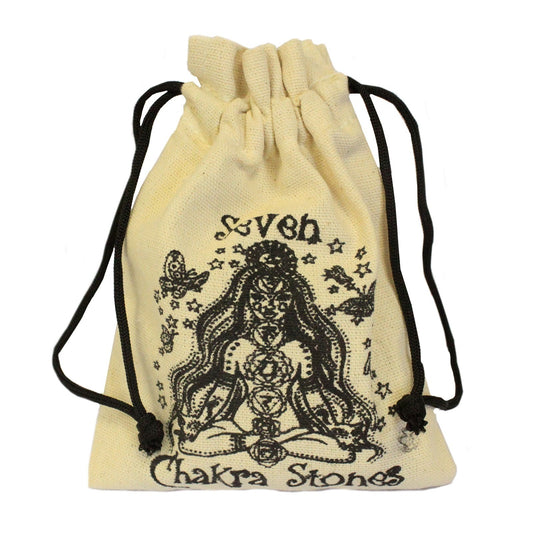 A drawstring pouch displays an ink drawing of a seated person with chakra symbols and long hair, surrounded by stars, birds, and butterflies, set against a white backdrop. Text: “Seven Chakra Stones.”