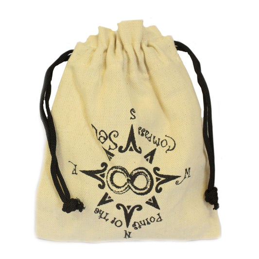 A drawstring pouch sits on a white surface, displaying a compass rose design with text reading "Compass Points of The". The pouch is light-colored, possibly canvas. The drawstrings are black.