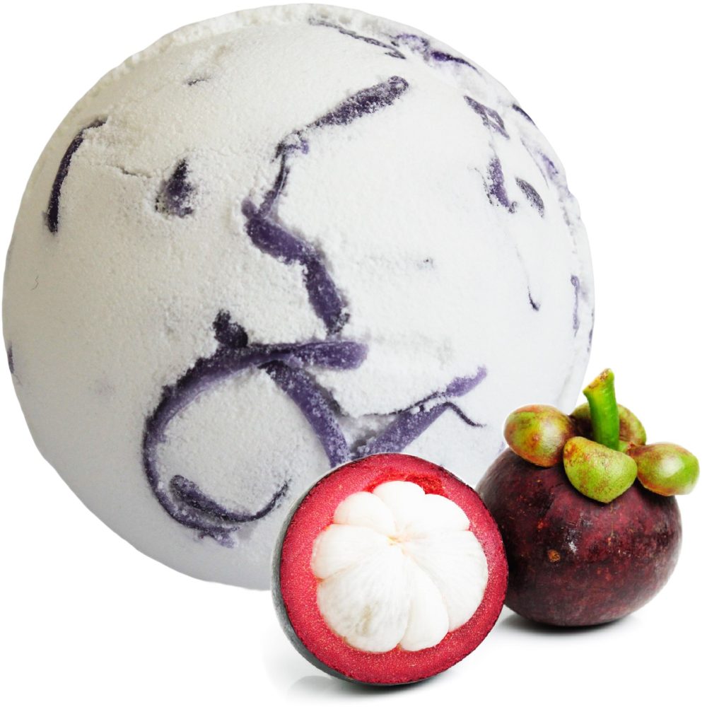 A round bath bomb with purple swirls sits beside whole and halved mangosteens on a white background.