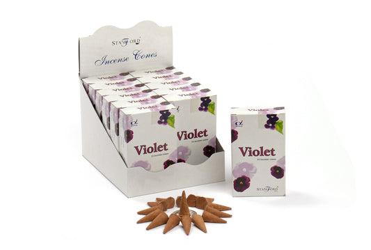 A display box of "Stamford" incense cones with multiple smaller "Violet" boxes inside shows one box outside accompanied by several brown incense cones scattered around.