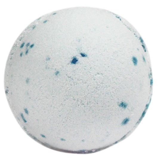 White spherical object with blue speckles, resembling a textured bath bomb, placed against a plain background.