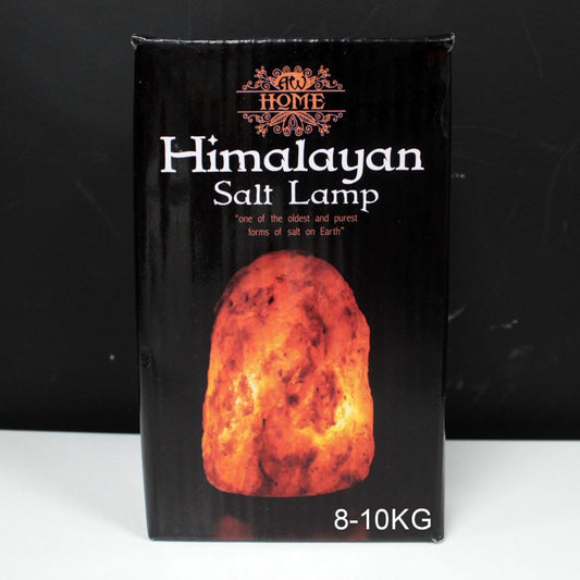 A Himalayan salt lamp package displays a glowing orange salt lamp on a black background with the text: "HOME Himalayan Salt Lamp 'one of the oldest and purest forms of salt on Earth' 8-10KG."
