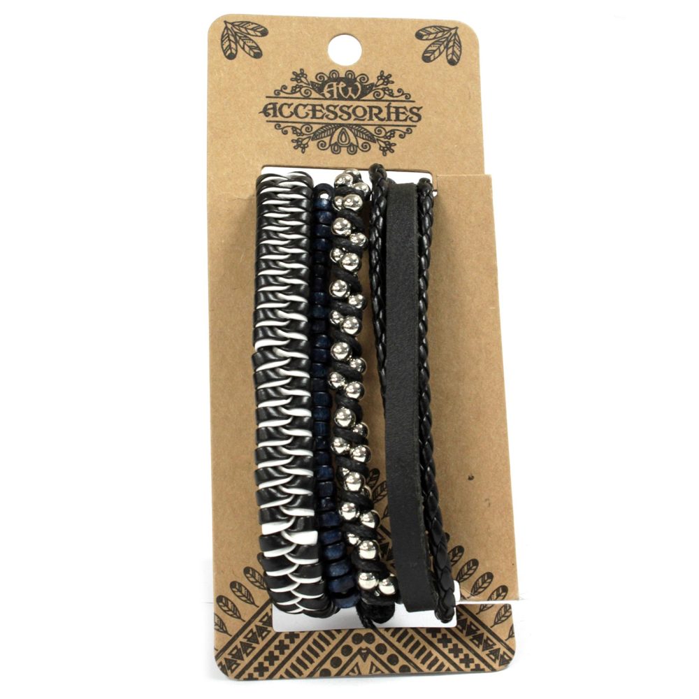 Four bracelets sit on a brown cardboard display, with the text "accessories" at the top, above the accessories. The bracelets are black and white leather, beads, and braided rope.