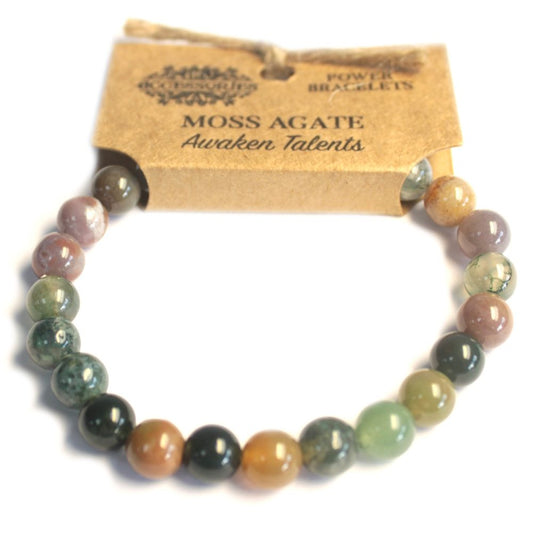 A "Moss Agate" beaded bracelet is displayed against a white background. Above the bracelet, a brown cardboard tag reads "Power Bracelets, Moss Agate, Awaken Talents."