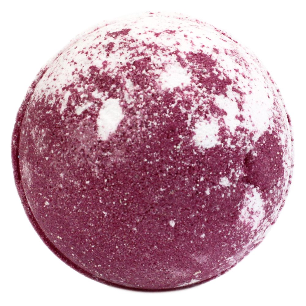 A maroon and white speckled bath bomb sits still, resembling a planet with textured surface detail, set against a plain white background.