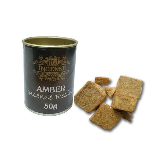A cylindrical container labeled "HW Incense, Amber Incense Resin, 50g" is displayed beside several brown, square resin pieces. The items are set against a plain white background.