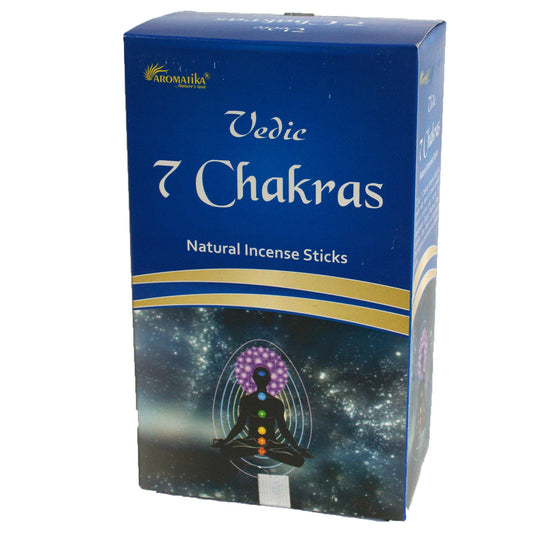 A blue box labeled "Vedic 7 Chakras Natural Incense Sticks" features a graphic of a meditating figure with chakras, set against a cosmic background. Brand: Aromatika.