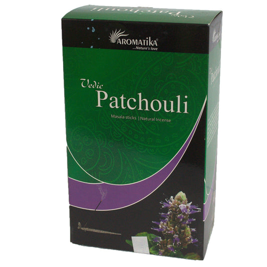 Box displaying "Aromatika Vedic Patchouli Masala sticks | Natural Incense" with green and purple design, paisley pattern, and a blooming flower at the bottom.
