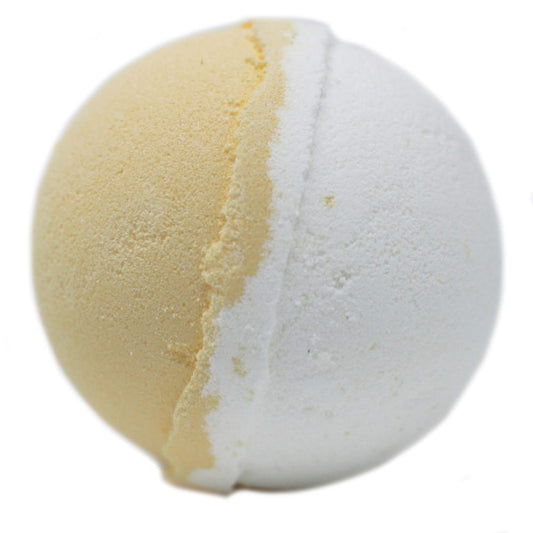 A spherical bath bomb with one half orange and the other white, sits against a plain white background.