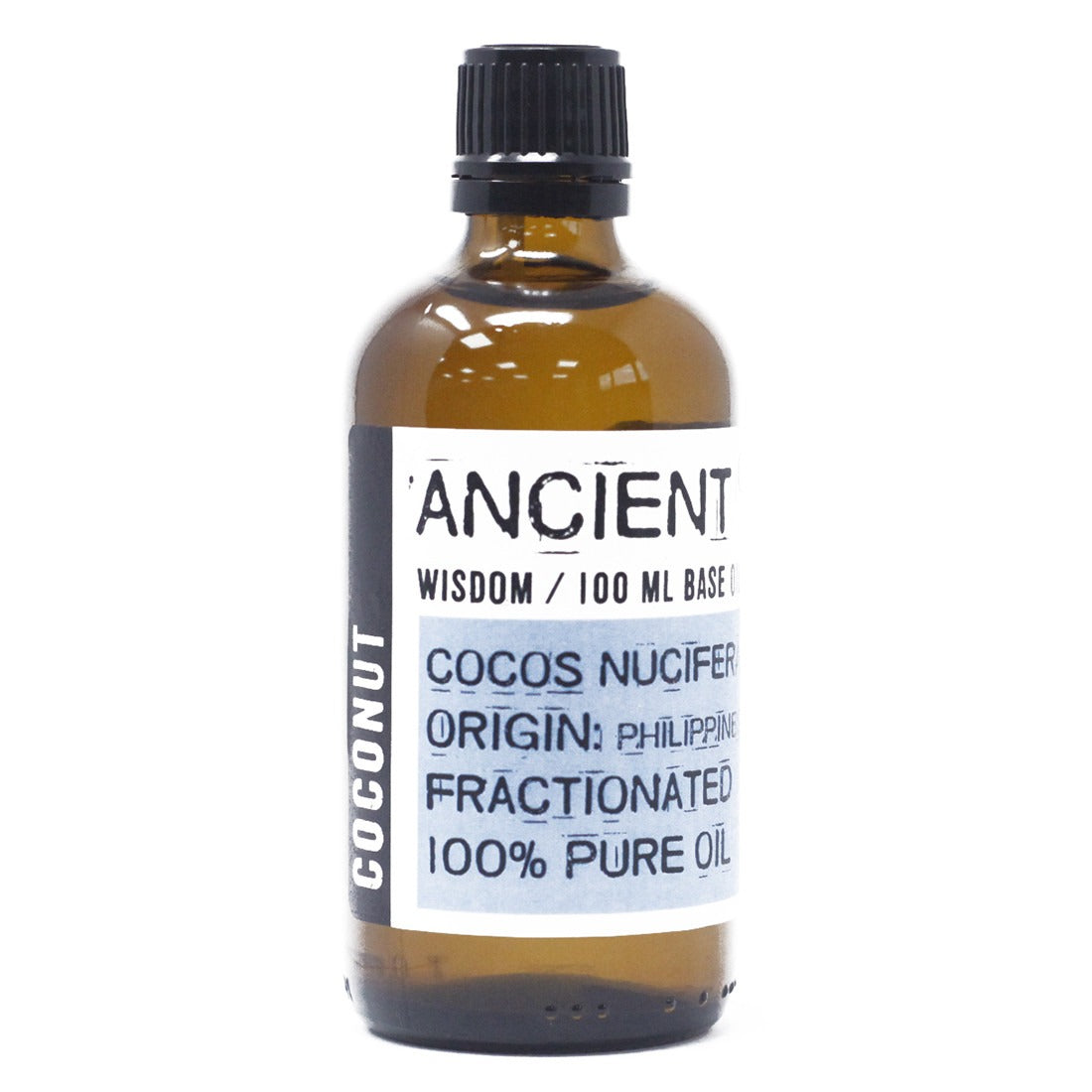 A brown bottle with a black cap stands on a white surface. The label reads "ANCIENT WISDOM / 100 ML BASE COCOS NUCIFER ORIGIN: PHILIPPINE FRACTIONATED 100% PURE OIL" and "COCONUT" along the side.