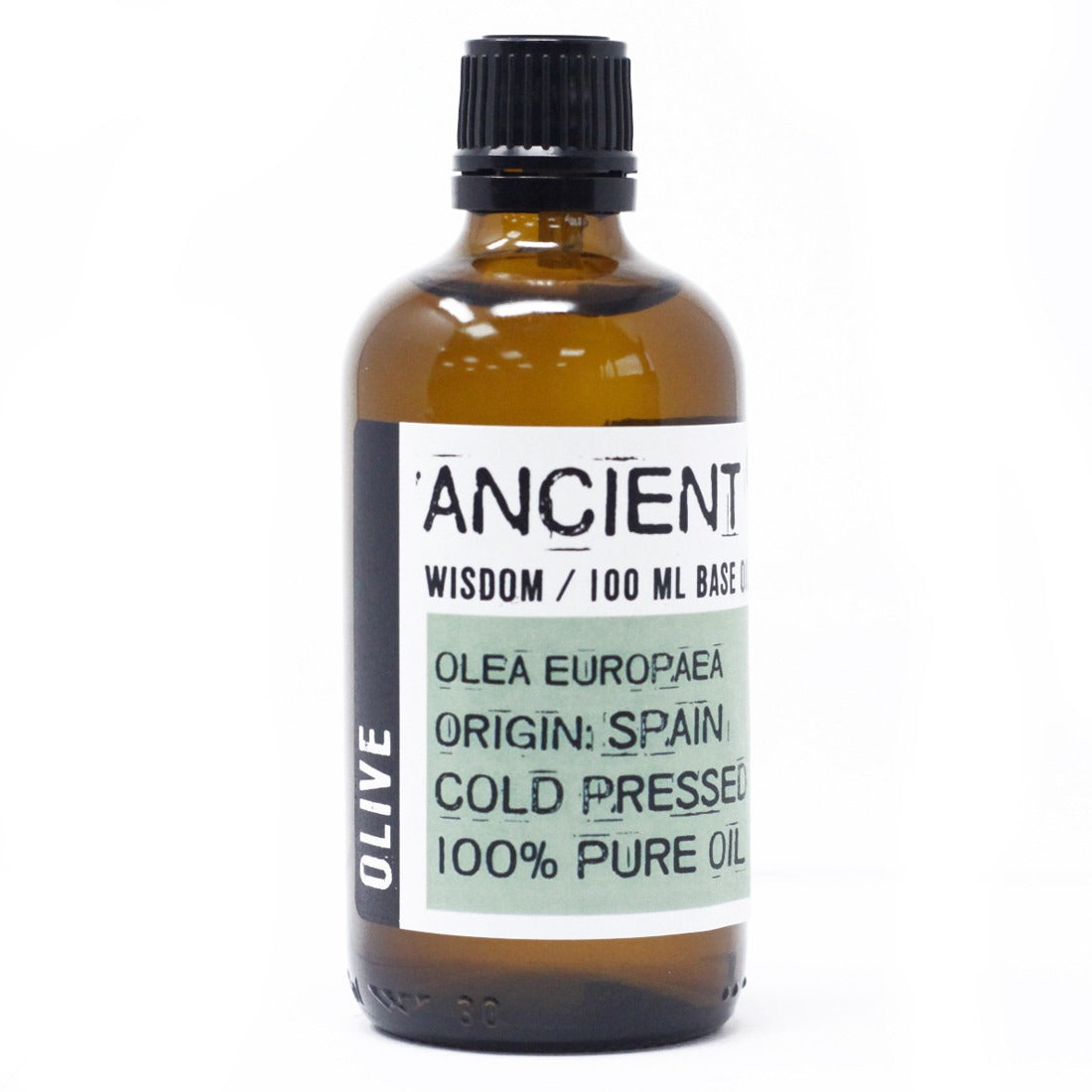 A small, brown glass bottle stands on a white surface filled with olive oil. It has a black cap and label: "OLIVE," "ANCIENT WISDOM / 100 ML BASE O," "OLEA EUROPAEA ORIGIN: SPAIN COLD PRESSED 100% PURE OIL."
