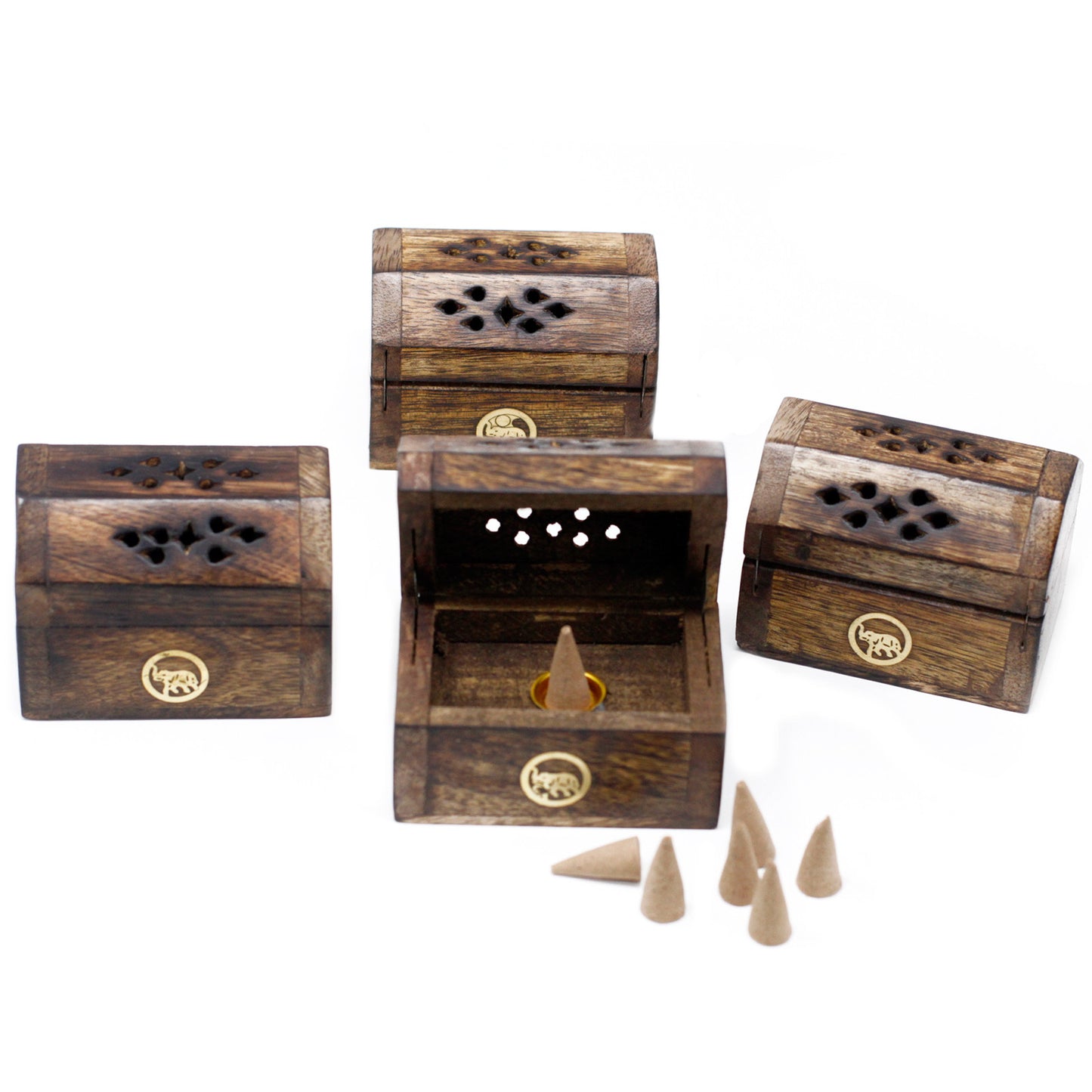 Wooden incense boxes with intricate cut-out patterns, some open displaying cone incense inside, surrounded by scattered incense cones, rest on a white background.