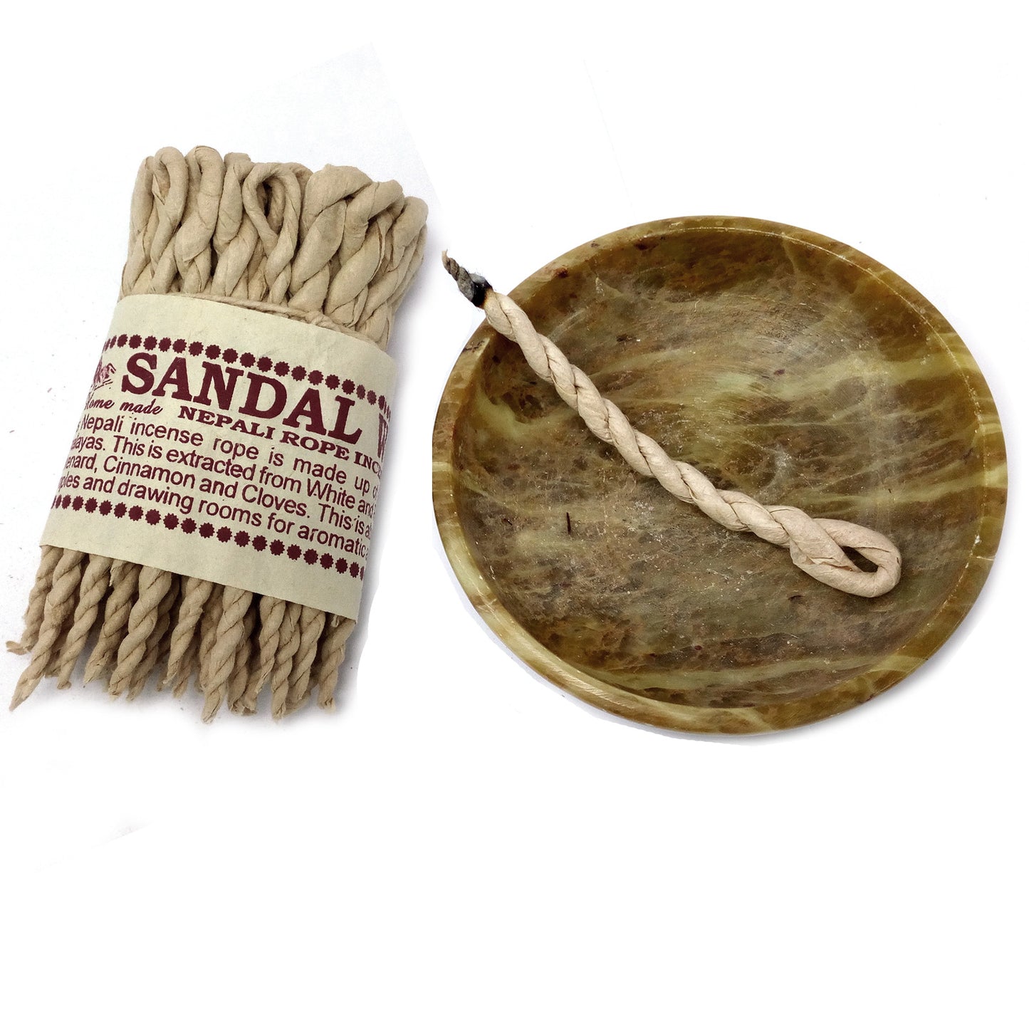 A bundle of twisted rope incense labeled "Sandal Nepali Rope Incense" lies beside a burning piece on a circular, brown marbled dish. The text describes ingredients and usage for aroma.