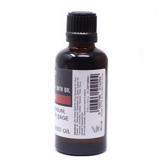 A dark brown glass bottle with a black cap is seen against a white background. The bottle has a label with "BATH OIL" written at the top with the ingredients listed below. The label also includes text such as "50 ML e 1.69 fl oz BC-AWP781088" and "PACKED IN THE UK BY AWM LTD, S3 8AL".