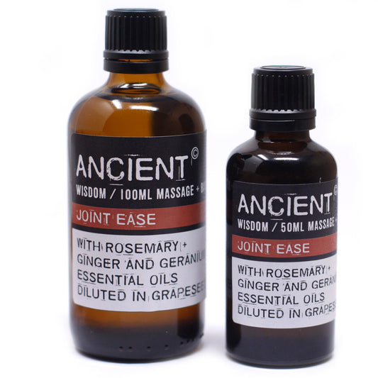 Two brown glass bottles stand against a white background. The bottles are labeled "ANCIENT WISDOM / 100ML MASSAGE +" and "ANCIENT WISDOM / 50ML MASSAGE" and include the ingredients "WITH ROSEMARY + GINGER AND GERANIUM ESSENTIAL OILS DILUTED IN GRAPES" and "JOINT EASE".