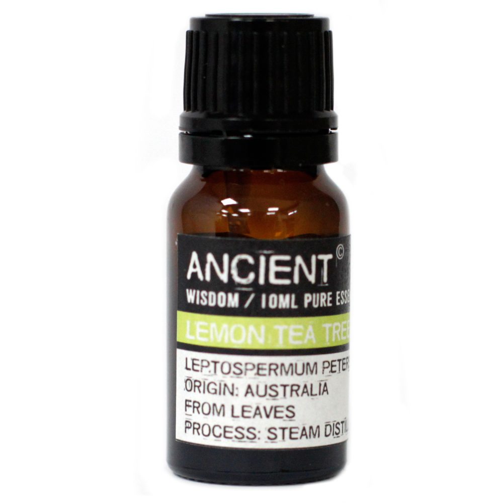 A small amber glass bottle of "Ancient" brand lemon tea tree oil stands on a white surface. The label includes, "ANCIENT WISDOM / 10ML PURE ESS, LEMON TEA TREE, LEPTOSPERMUM PETER, ORIGIN: AUSTRALIA FROM LEAVES, PROCESS: STEAM DIST."