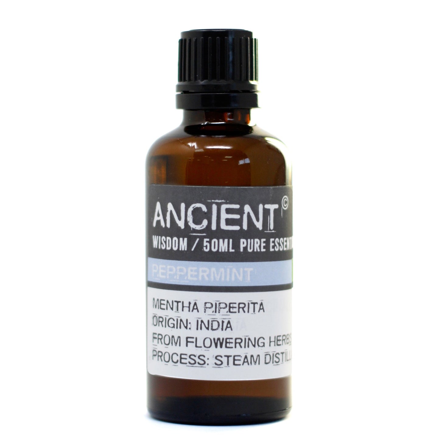 A brown glass bottle, capped with black, is standing on a white surface. It has a label with the following text: ANCIENT, WISDOM / 50ML PURE ESSENT, PEPPERMINT, MENTHA PIPERITA, ORIGIN: INDIA, FROM FLOWERING HERBS, PROCESS: STEAM DISTIL.