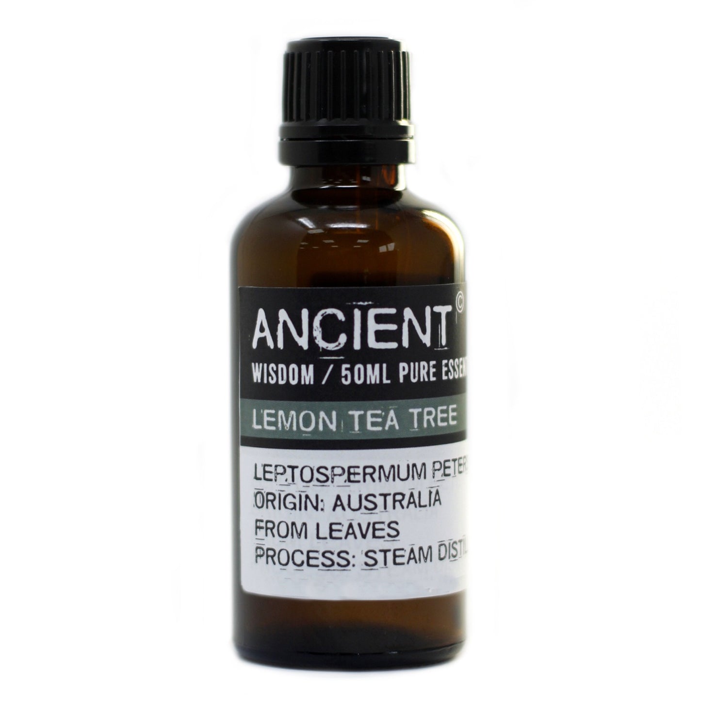 A brown glass bottle stands on a white surface. The label reads: “ANCIENT WISDOM / 50ML PURE ESSEN LEMON TEA TREE LEPTOSPERMUM PETER ORIGIN: AUSTRALIA FROM LEAVES PROCESS: STEAM DISTIL.”