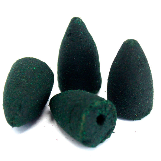 Four dark cone-shaped incense cones are arranged closely together, with a rough texture, set against a plain white background.