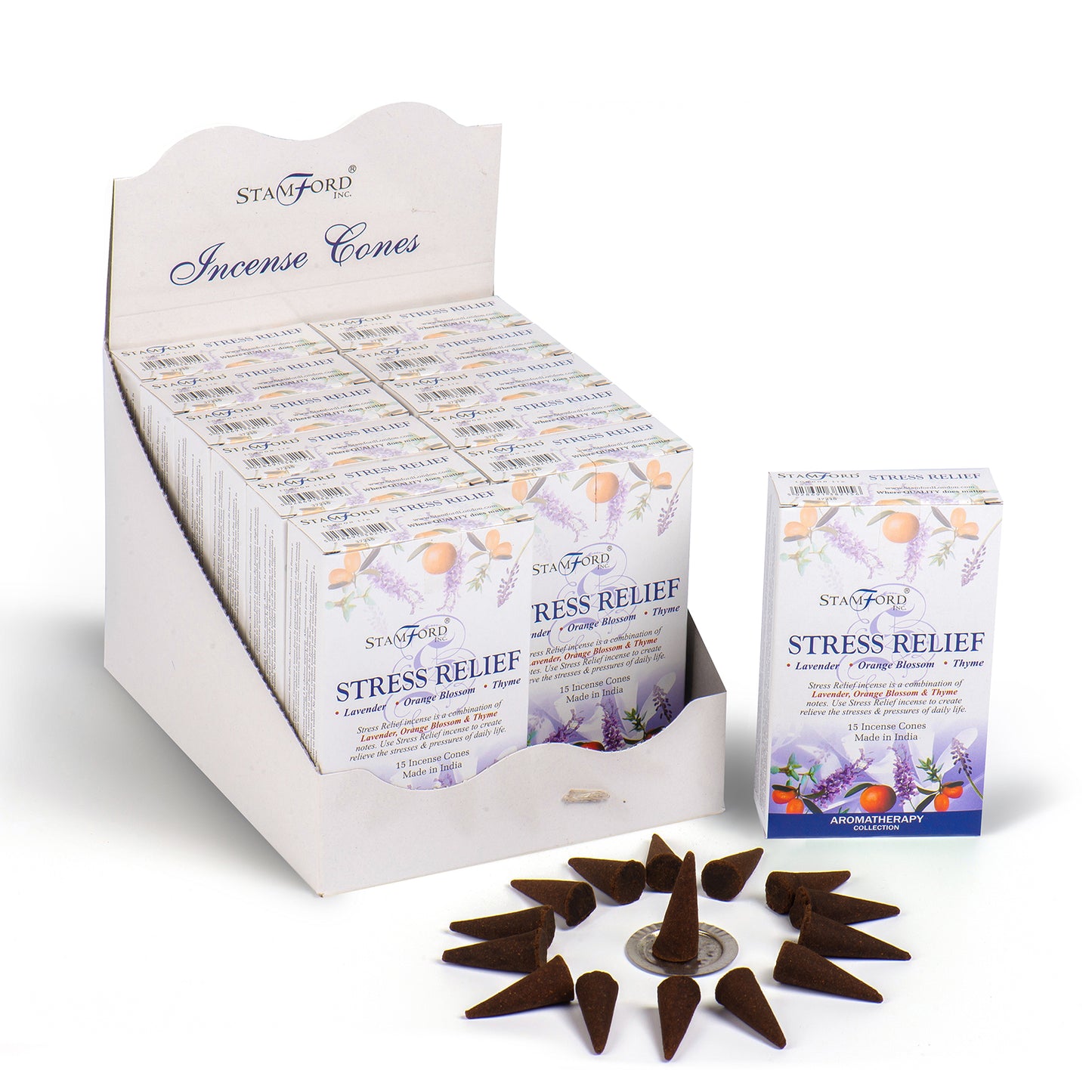 Incense cones are arranged around a holder beside a box labeled "STAMFORD Stress Relief Incense Cones," featuring lavender, orange blossoms, and thyme. The packaging states "Aromatherapy Collection" and "Made in India."