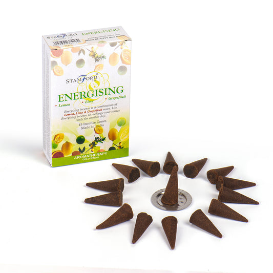 Incense cones are arranged in a circle around a metal stand. To the left, a package labeled "Stamford Energising" promotes lemon, lime, and grapefruit aromatherapy, stating "15 Incense Cones Made in India."