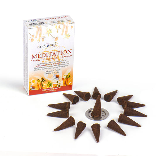 Box labeled "Stamford Meditation: Vanilla, Sandalwood, Camomile" stands beside 15 brown incense cones arranged in a circular pattern around a metal holder on a white surface. Text: "Aromatherapy Collection, Made in India."