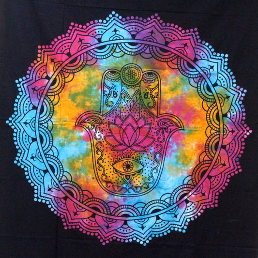 A hamsa, detailed with a lotus and an eye, is displayed centrally within a circular mandala on a tie-dye background.