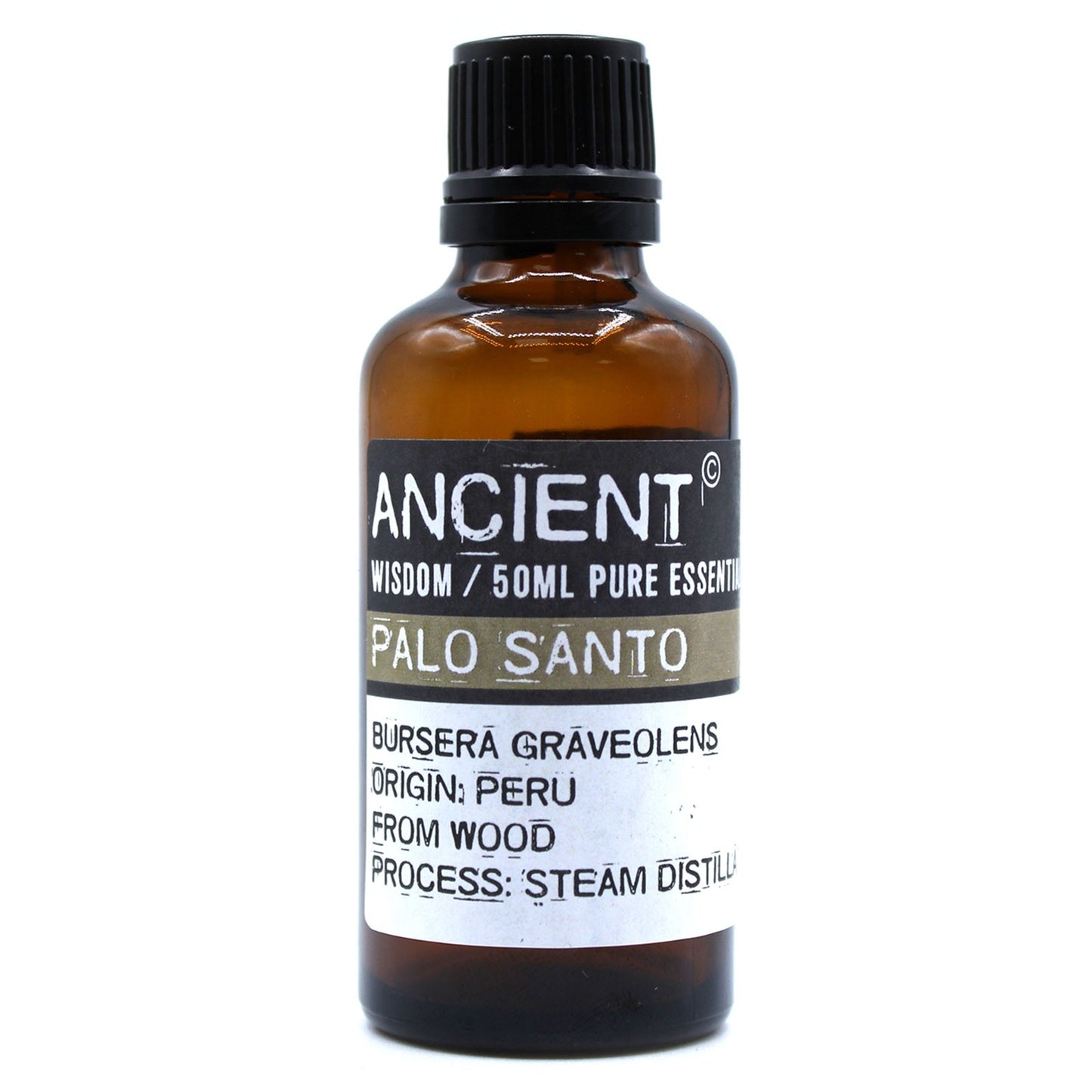 An amber bottle stands on a white surface, labeled “ANCIENT, WISDOM/50ML PURE ESSENTIAL, PALO SANTO, BURSERA GRAVEOLENS, ORIGIN: PERU, FROM WOOD, PROCESS: STEAM DISTILLI". It is capped with a black lid.