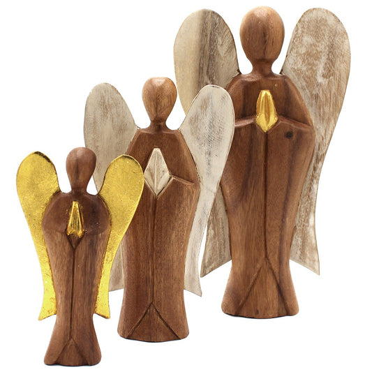 Three stylized wooden angel figures stand in a row; the smallest angel on the left has gold wings, while the others have white wings. The figures' hands are together. Background is plain white.