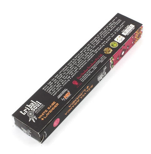 A long, black box labeled "Tribal Soul Incense" features text and logos, promoting "White Sage + Lavender." The packaging includes product details and branding, designed for a fragrant, aromatic experience.