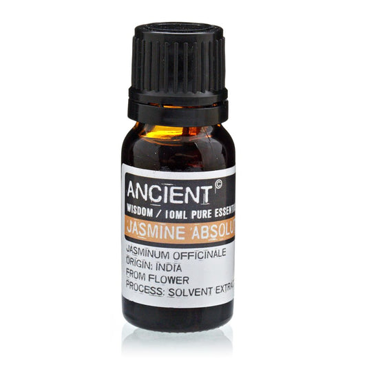 A small, brown glass bottle sits still, its black cap ribbed. The label reads "ANCIENT WISDOM / 10ML PURE ESSENTI JASMINE ABSOLU JASMINUM OFFICINALE ORIGIN: INDIA FROM FLOWER PROCESS: SOLVENT EXTRAC" against a bright, plain background.