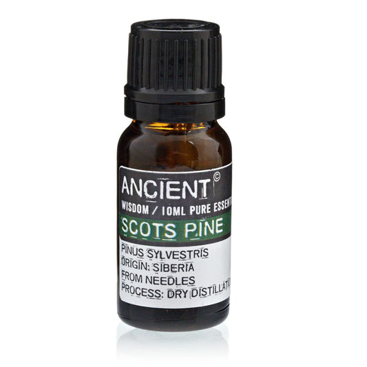 A small, brown bottle of "ANCIENT WISDOM / 10ML PURE ESSENT SCOTS PINE" essential oil sits upright. Its label details "PINUS SYLVESTRIS," "ORIGIN: SIBERIA," "FROM NEEDLES," and "PROCESS: DRY DISTILLATO."