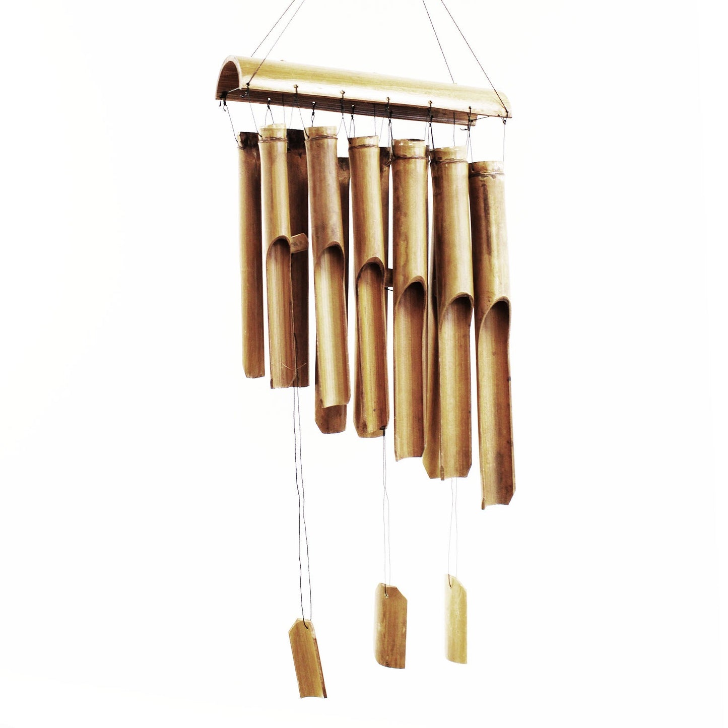 A bamboo wind chime hangs against a white background. The chime is composed of numerous hollow bamboo tubes of varying lengths, suspended from a small wooden frame. Three smaller bamboo pieces hang below.
