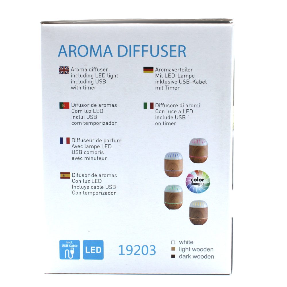 A white box for an "AROMA DIFFUSER," displays multilingual instructions. Images show a wooden diffuser with color-changing lights, plus icons for “incl. USB cable” and “LED,” and the number “19203.”