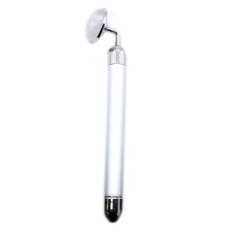A cylindrical silver face massage tool with a rounded, smaller roller head extends outward to the side; the context is a plain white background.