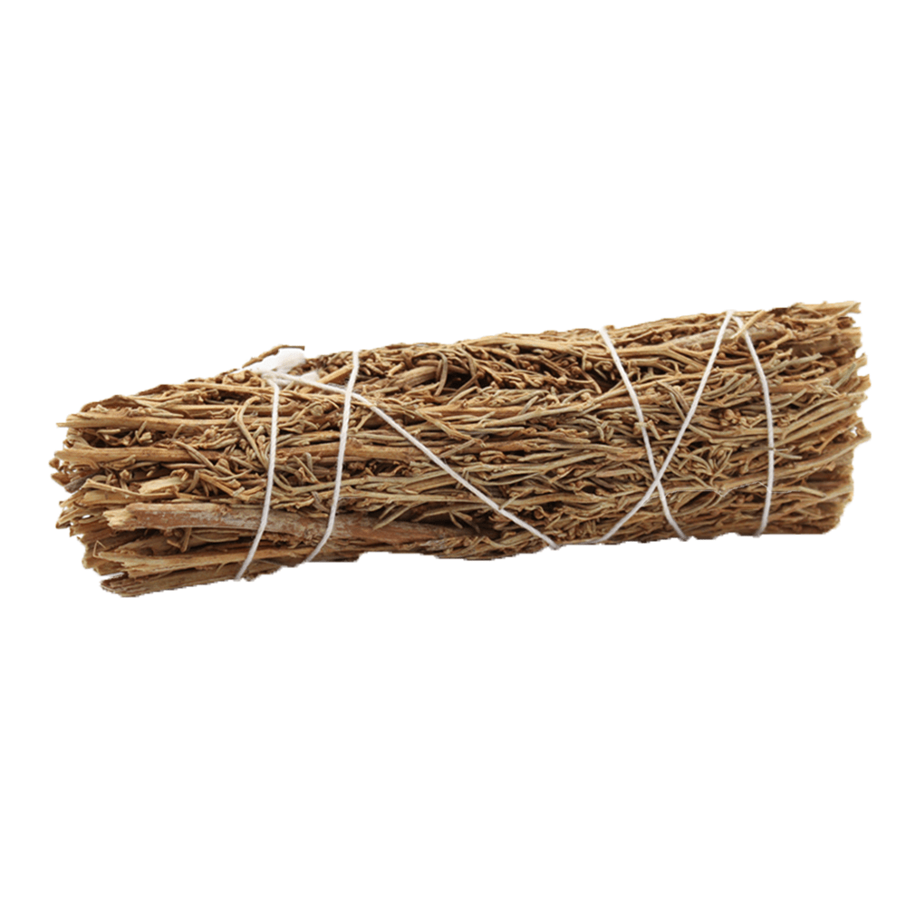 A bundle of dried, light-brown twigs is tightly bound together with white string, resting on a plain white surface.
