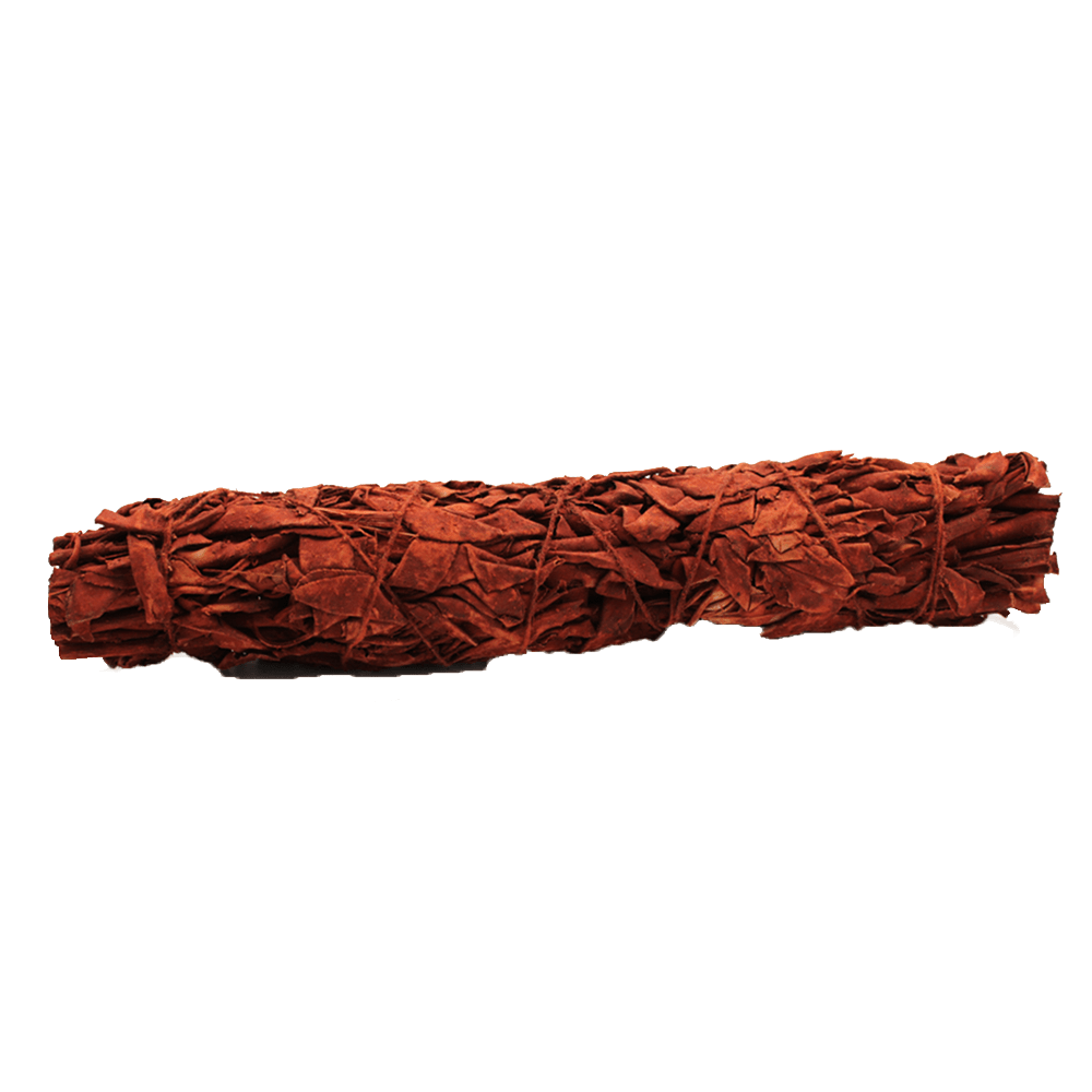 A long, brown smudge stick lies horizontally, tied with twine, against a stark white background.