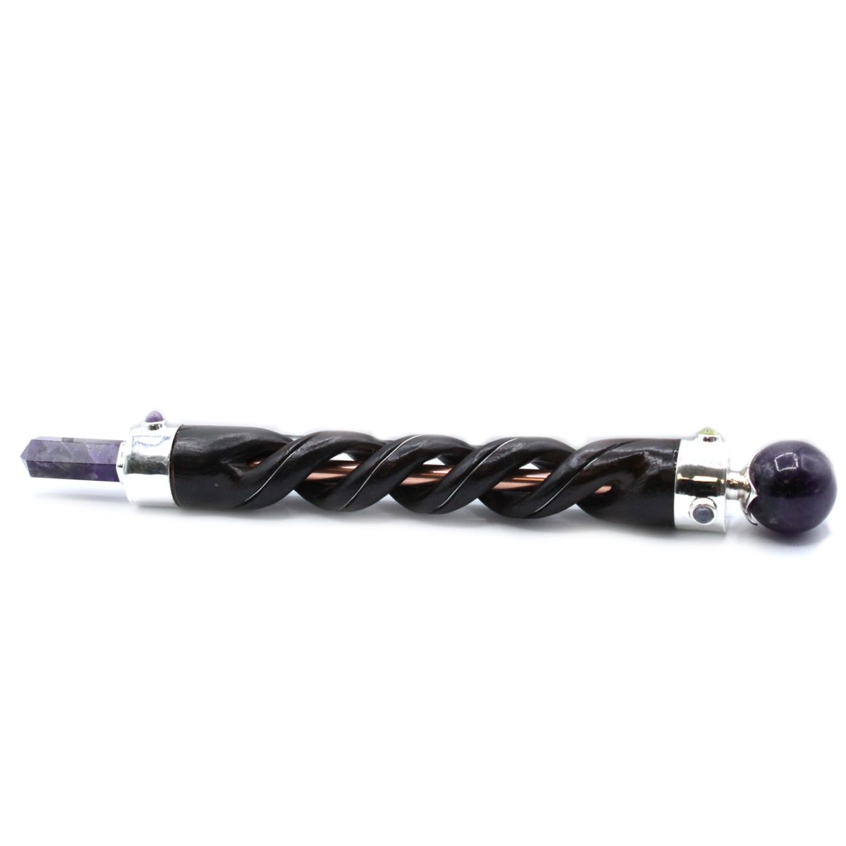 A dark brown, twisted wooden wand lies horizontally, with amethyst stones at both ends, all on a white surface.