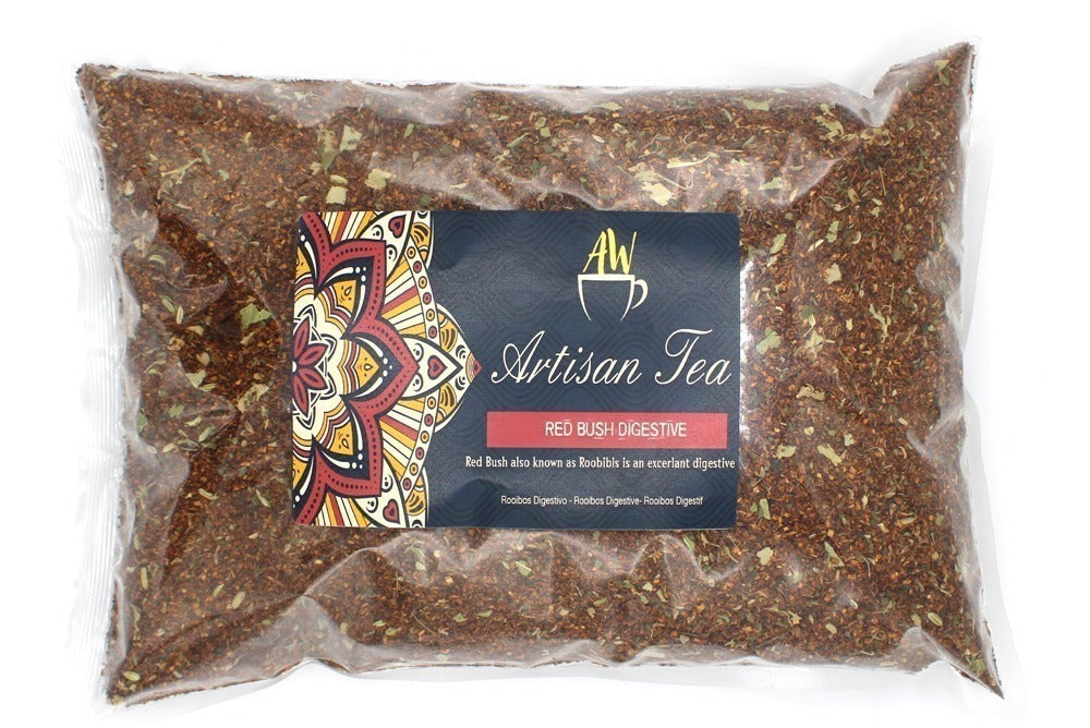 A sealed plastic bag contains brown tea leaves labeled "AW Artisan Tea, Red Bush Digestive." The label features a colorful mandala design with text: "Red Bush also known as Roobbis is an excellant digestive Roobios Digestive - Rooibos Digestive - Roolbos Digestif."