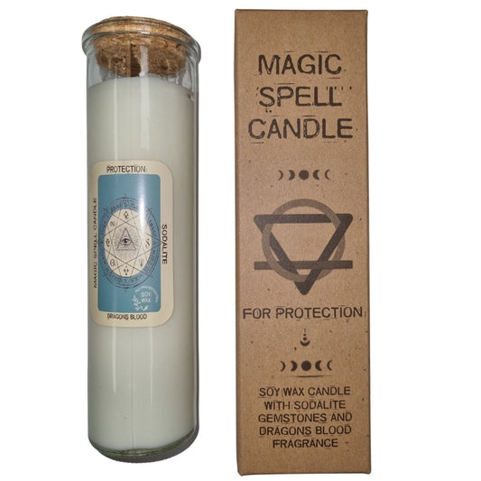 Glass white protection candle and cardboard package standing upright on a white background, labeled with occult symbols; text: MAGIC SPELL CANDLE; FOR PROTECTION; SOY WAX CANDLE WITH SODALITE GEMSTONES AND DRAGONS BLOOD FRAGRANCE; PROTECTION; MAGIC SPELL CANDLE; SODALITE; DRAGONS BLOOD; SOY WAX