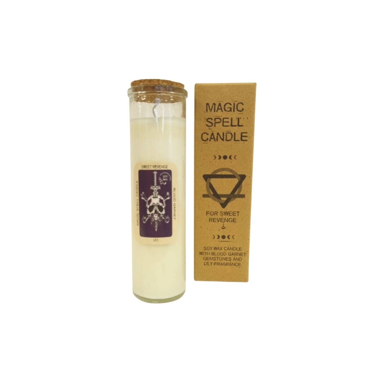 A white candle, labeled "MAGIC SPELL CANDLE SWEET REVENGE BLOOD GARNET LILY", stands next to its packaging, which reads, "MAGIC SPELL CANDLE…FOR SWEET REVENGE…SOY WAX CANDLE WITH BLOOD GARNET GEMSTONES AND LILY FRAGRANCE".