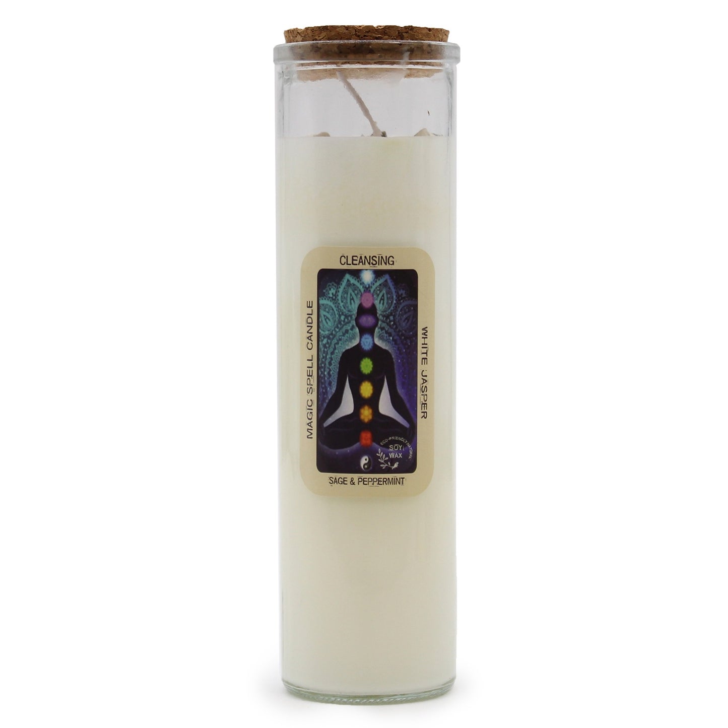 A cylindrical white candle is standing on a white surface. It has a cork lid and a label that reads "CLEANSING," "MAGIC SPELL CANDLE," "WHITE JASPER," "SAGE & PEPPERMINT" and includes an illustration of a figure meditating with chakra points.