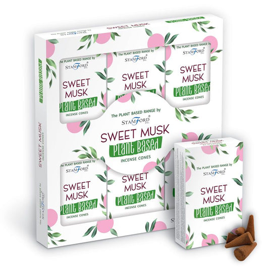 Box of incense cones labeled "SWEET MUSK PLANT BASED" by Stamford, surrounded by pink and green leafy design, displayed with additional smaller box and three brown incense cones.