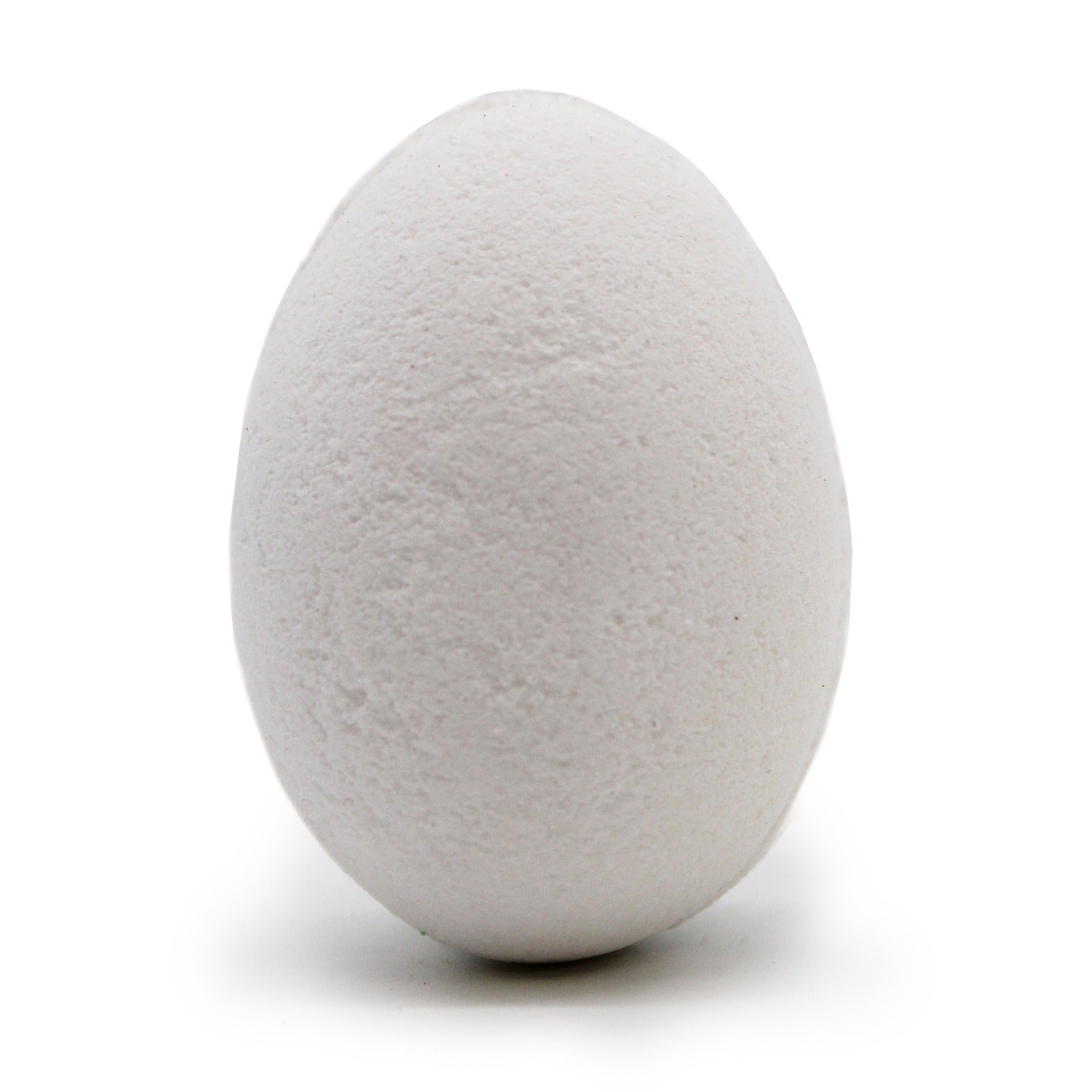 Egg standing upright on a white surface, displaying a textured, off-white shell, with no visible markings or text, set against a plain background.
