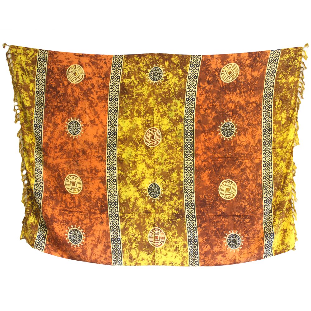 A sarong hangs, displaying a batik pattern of orange and yellow with dark vertical stripes and circular designs.